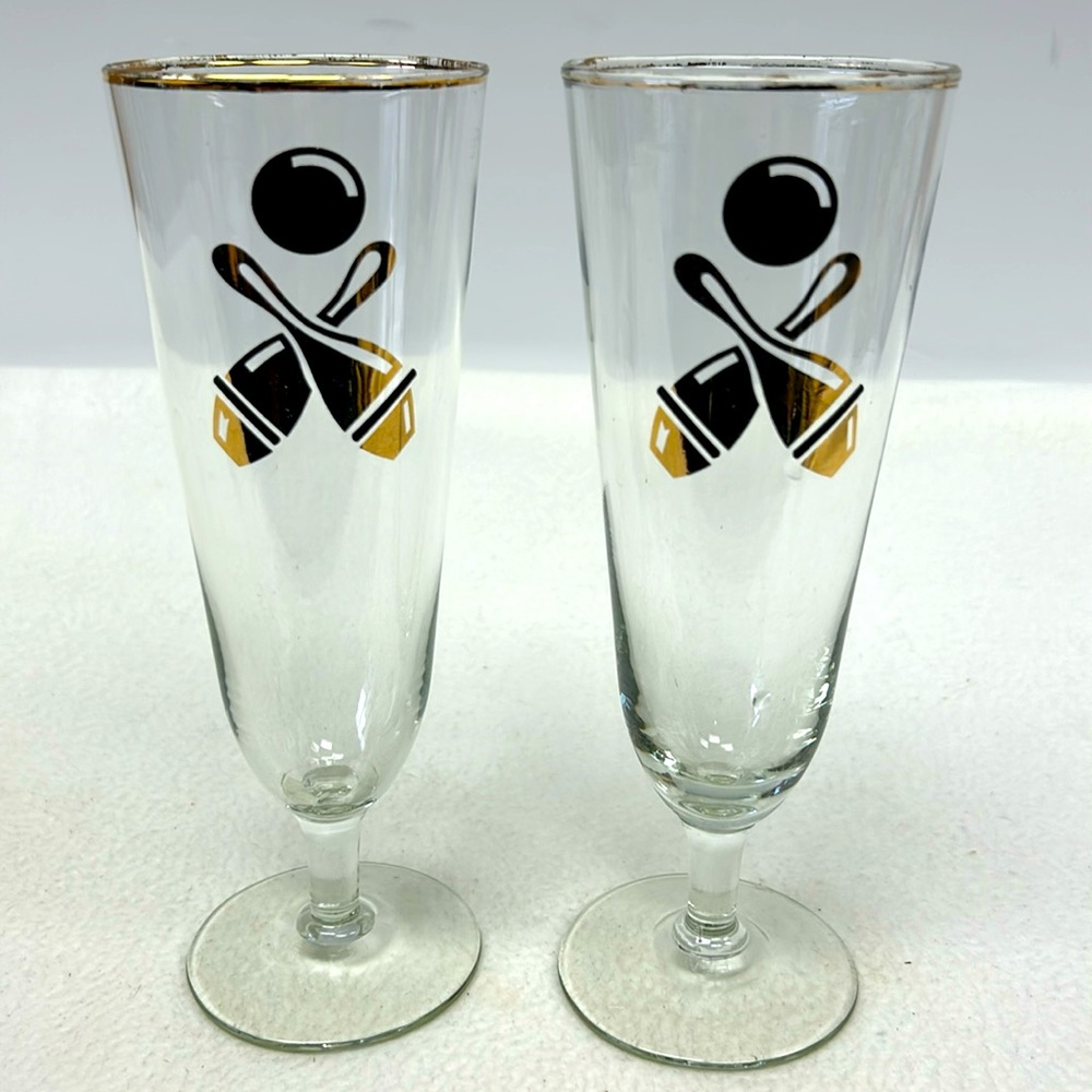 Vintage set of two Pilsner glasses with bowling design and gold accents